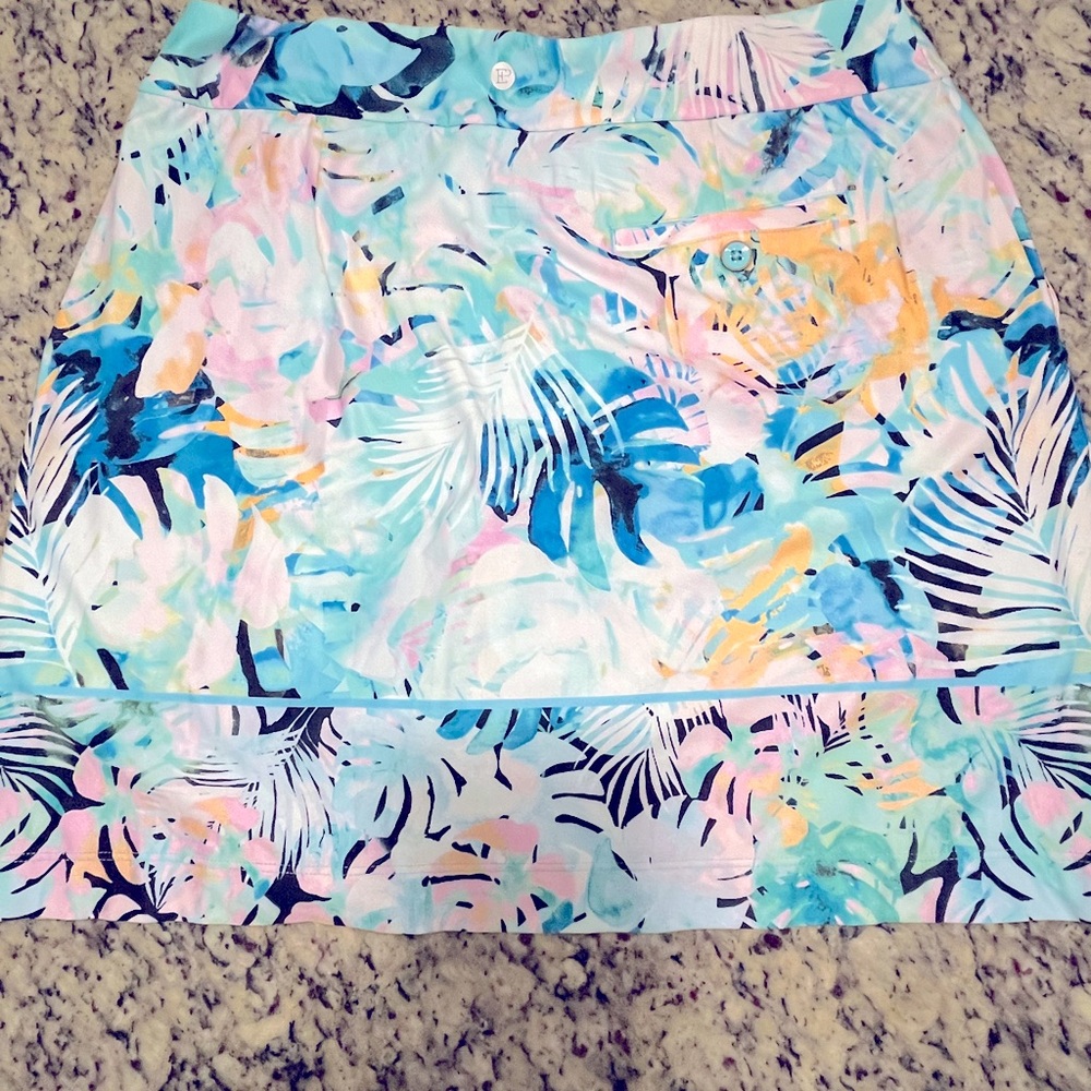New, with tags: Ladies EP New York Wicking athletic skirt w/ UV, size M.